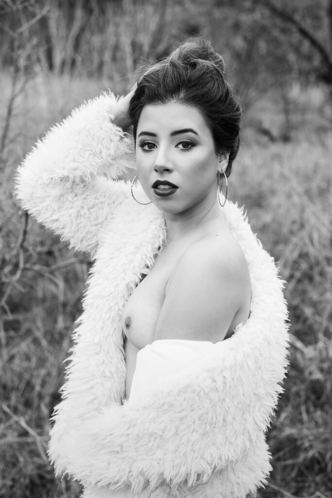 glamour portrait of outdoor boudoir wearing fur coat