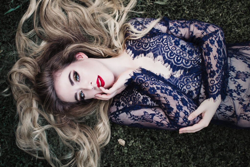 glamour portrait of woman with bold eyebrows and a classic red lip