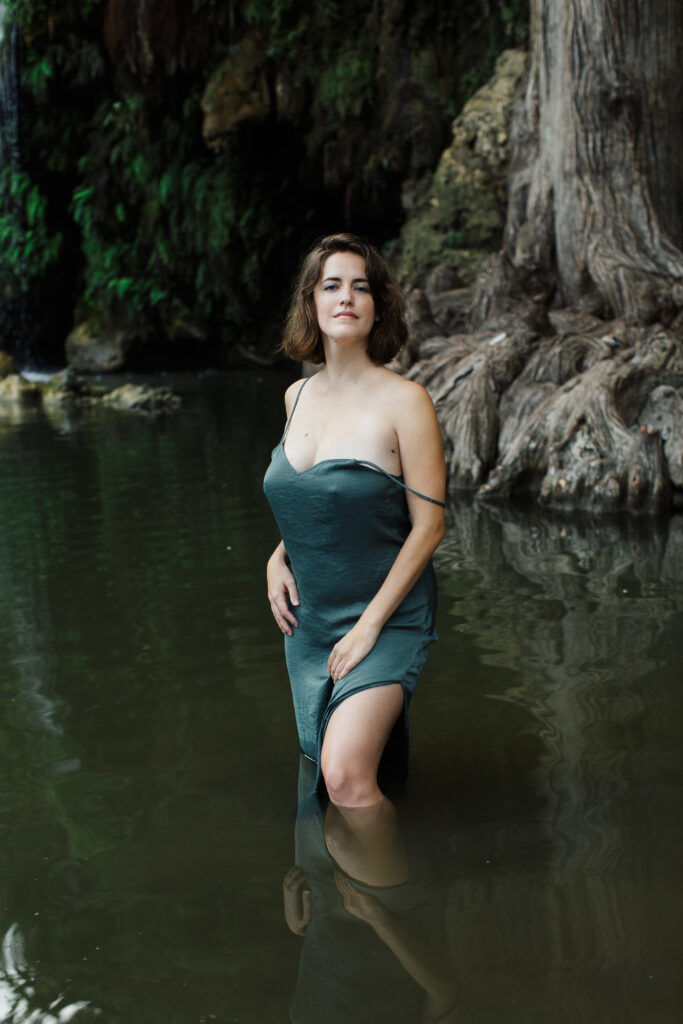 glamour portrait of woman outdoors wearing a slip dress